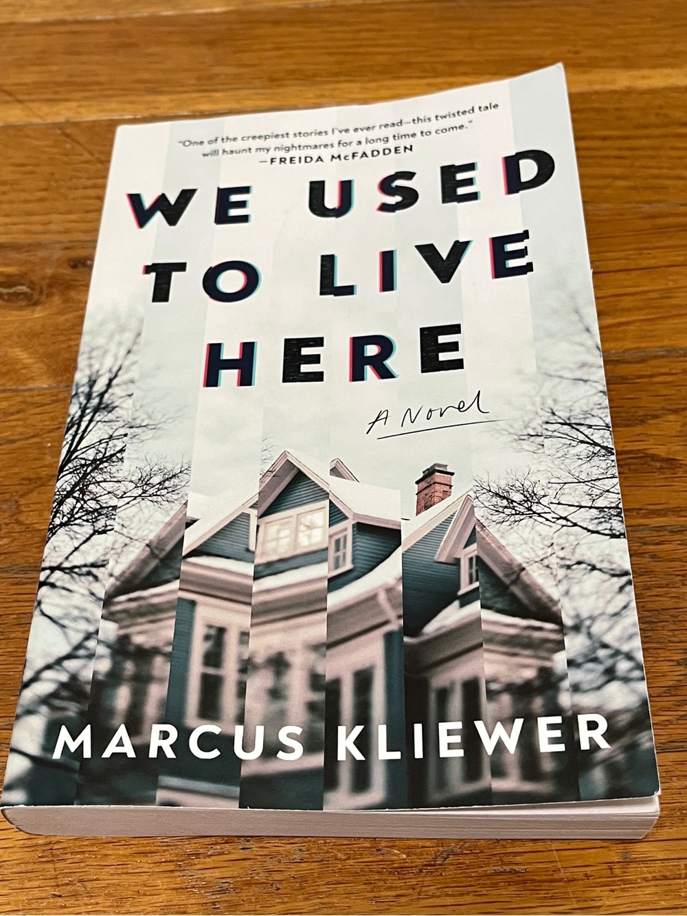 "We Used to Live Here" Paperback - White/Cream Cover